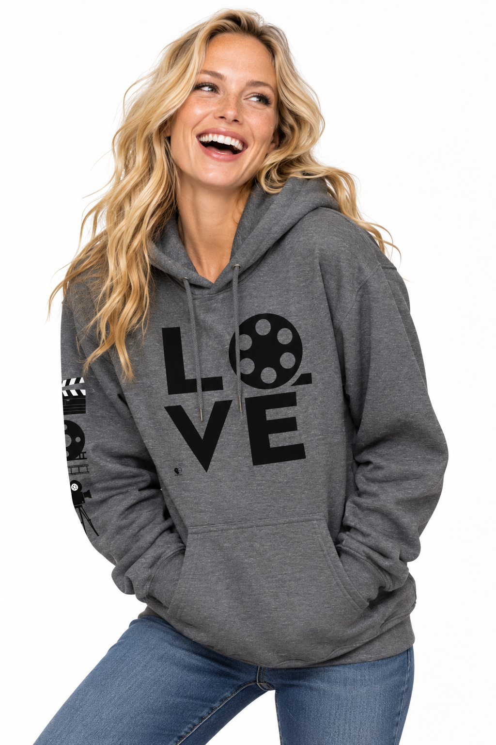 A woman wearing a heather gray pullover hoodie with a black graphic print that spells 'LOVE' using a film reel and script letters, paired with blue jeans against a white background.
