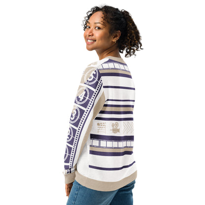 Woman wearing a patterned sweater on a white background