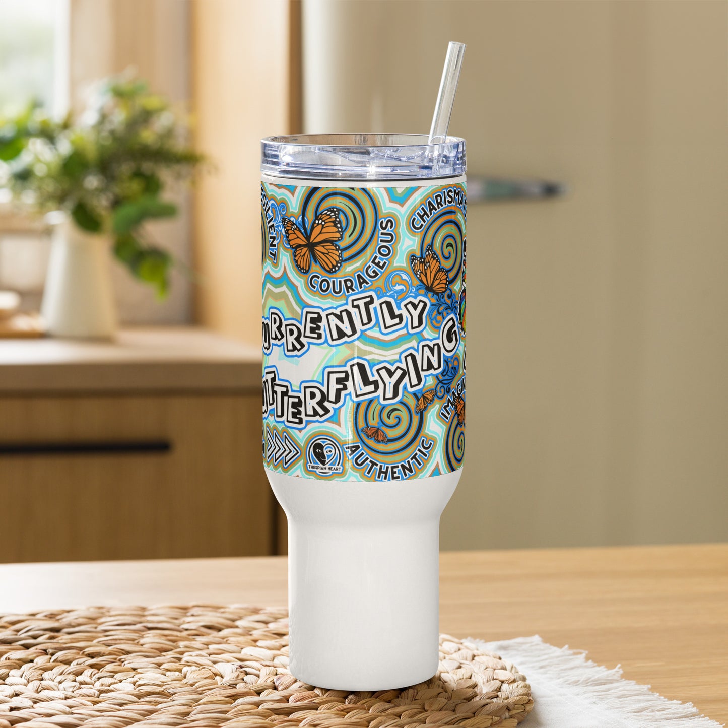 Currently Butterfly 40 oz Travel Mug with a handle