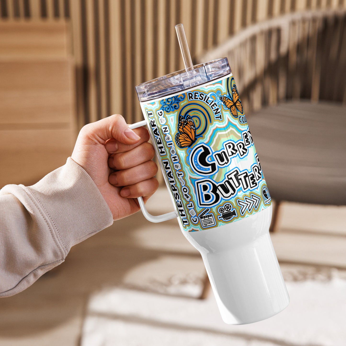 Currently Butterfly 40 oz Travel Mug with a handle